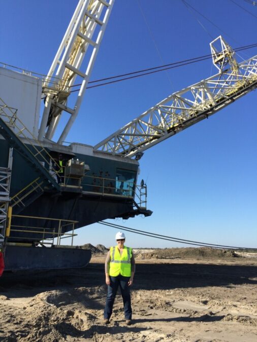 Standing beneath a dragline excavator at a mine site
